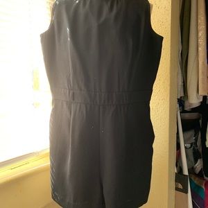 Romper with lace on the back.